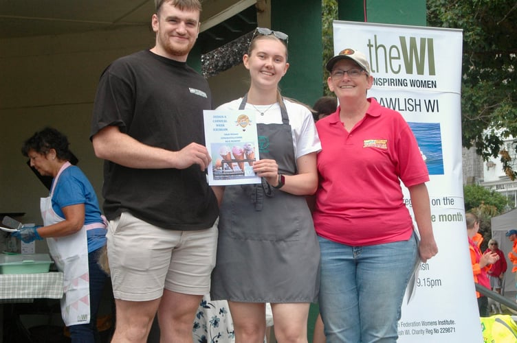 Nick Murphy, one of the create and ice cream for carnival competition winners with Lauren Kalynuk , manager of the Local Scoop with Angie Weatherhead, carnival chairman. 
