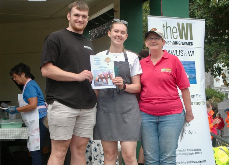 Nick Murphy, one of the create and ice cream for carnival competition winners with Lauren Kalynuk , manager of the Local Scoop with Angie Weatherhead, carnival chairman.