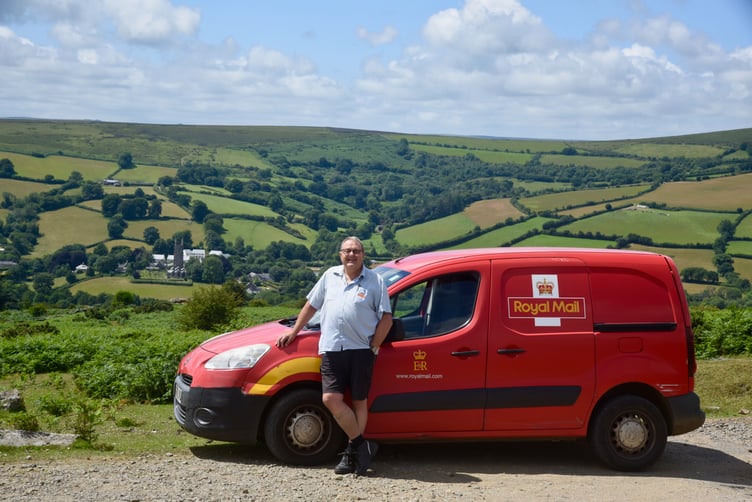 Postman Mike Leaman with his van above Widecombe in the Moor