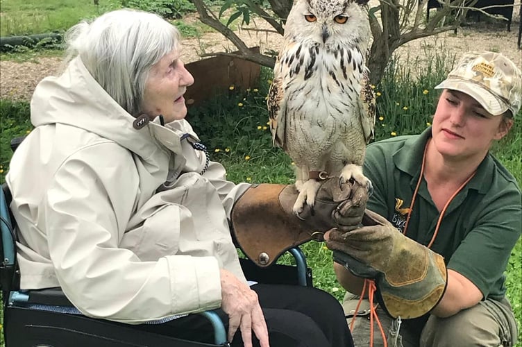 One of Joan's challenges before her death was to hold a bird of prey.