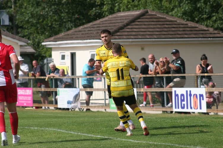 Jared Lewington celebrates his equaliser for Buckland