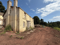 Plan to build homes on fire-ravaged manor house site 