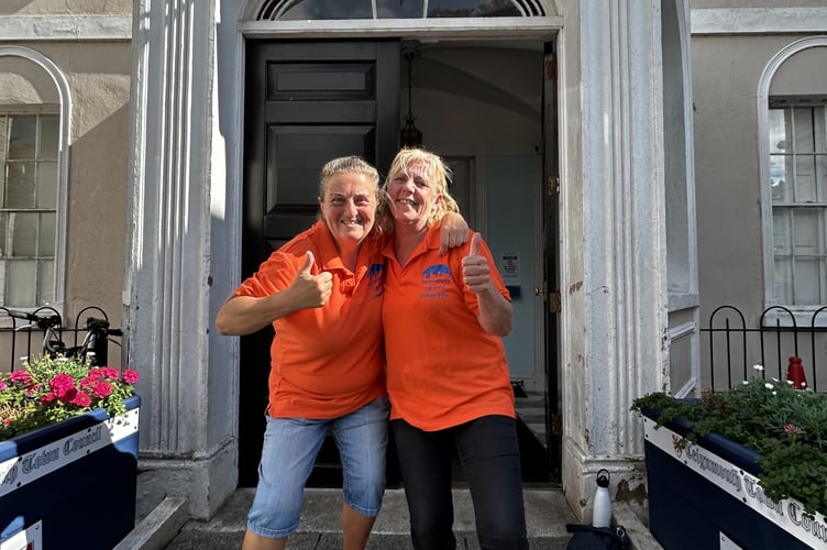 Sarah Woolway, left, and Cathy Hooper celebrating the grant outside the Town Council HQ at Bitton House. Photo Nigel Canham 
