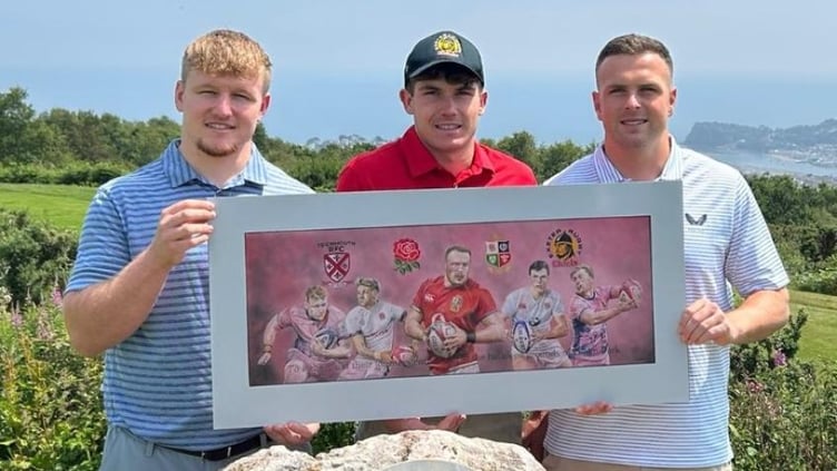 Teignmouth rugby greats, Max Norey, Ben Coen and Joe Simmonds MBE, with the 'Five Guys' painting