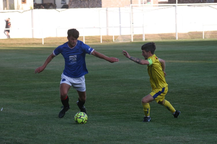 Calum Fyfe on the ball for Newton Abbot Spurs