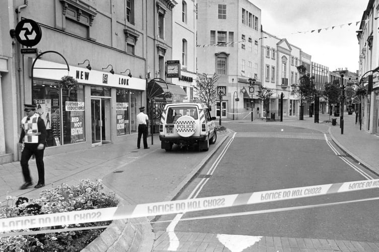 All quiet on the shopping front. Courtenay Steet in Newton Abbot is sealed off during a bomb scare in June 1994
