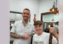Tyler's selfless haircut supports cancer charity