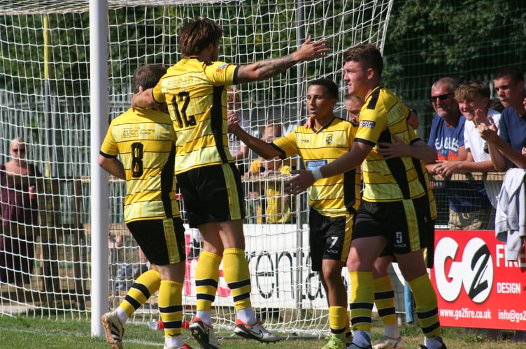 Buckland players celebrating Luke Forward's goal vs Newquay.