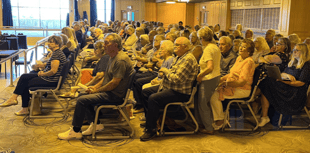 Angry protesters pack cardiac care council meeting