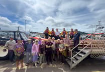 Boat club donates £8,000 to help save lives at sea