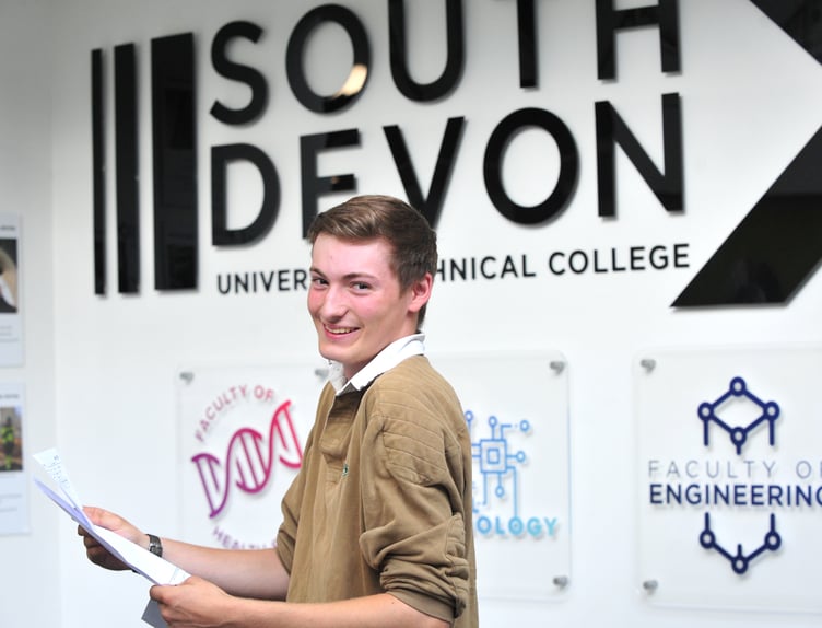 A Levels results day at South Devon University Technical College. Haddow Hales-Lavercombe evidently pleased with his Distinction D5 in BTEC Engineering. His plan now is to go on to an engineering-based apprenticeship.