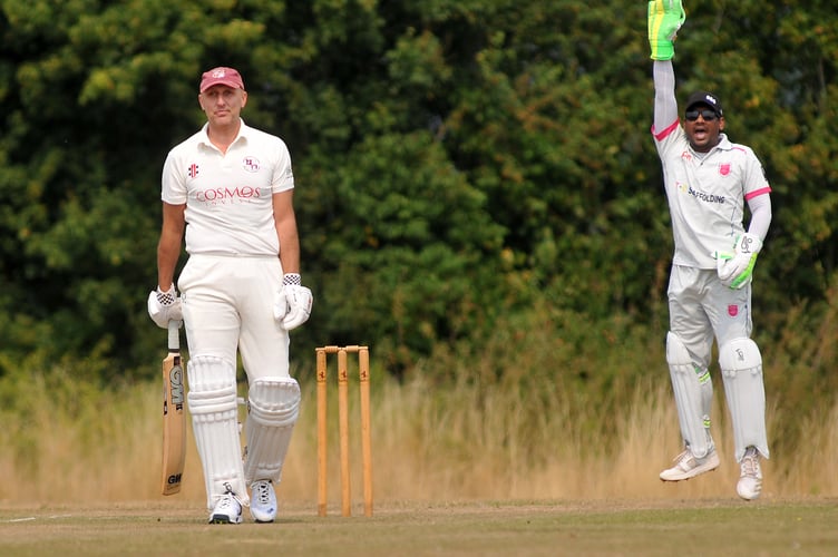 Devon Cricket League E Division West. Stokeinteignhead versus Dartington & Totnes. Stoke's 'keeper Karimulla Syed appeals for lbw but Dartington & Totnes batsman Justin Osborne is safe for now

Dartington & Totnes won the toss and chose to bat making 192/5 off 45 overs. Stoke took to the crease after tea scoring 195/8 in 30.2 overs and taking a two wicket win.