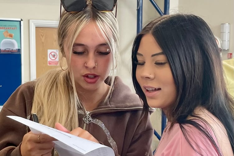 Mia Bell and Tia Cole open their GCSE Results at Dawlish College 2025