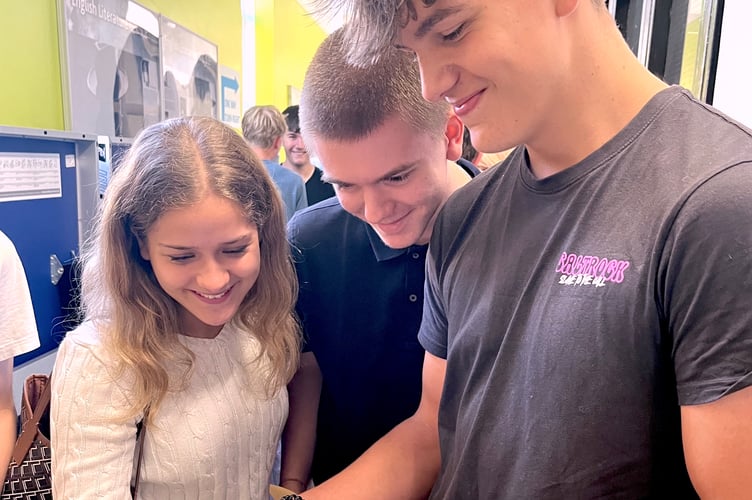 GCSE Levels results day at the Newton Abbot College.
Imogen Carpenter, William Stackhouse and Alex Thorne check their results