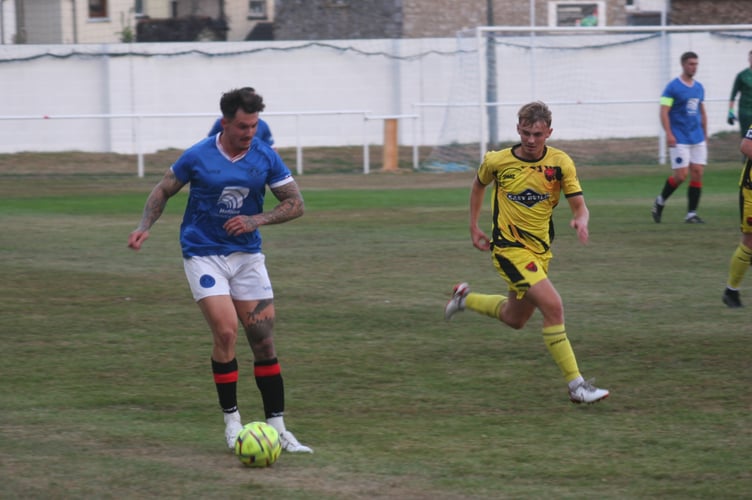 Brad Crocombe on the ball for Newton Abbot Spurs