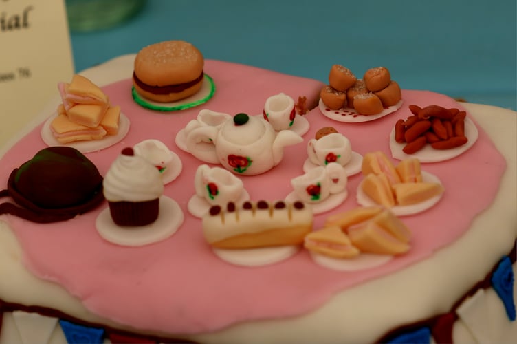 Miniature masterpiece - decoration on a winning cake in horticultural and produce marquee Photo: Owain Davies