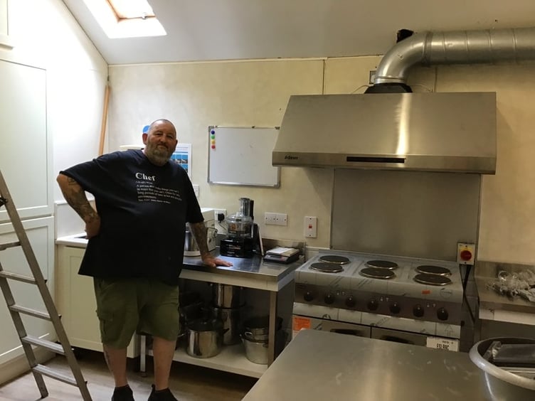 Paul Lentle, manager of the Strand Centre in Dawlish in the new kitchen.