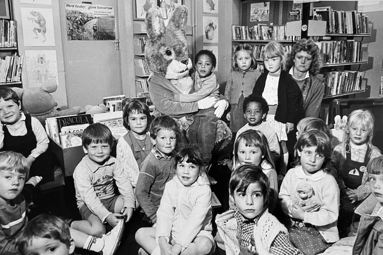 Peter Rabbit visits youngsters at Dawlish Library in June 1986