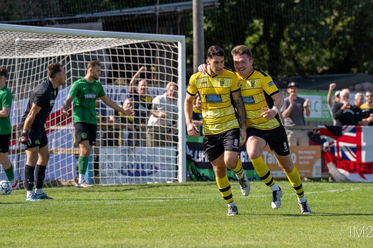 Goalscorers Ruben Kane (left) and Ryan Bush wheel away in celebration