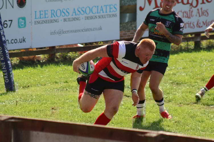 Jack Bond heading in for the first of his three tries