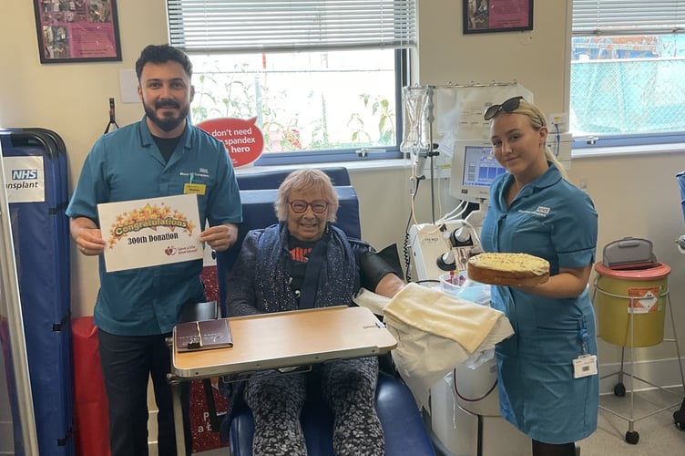 Joan Atkins making her 300th donation of platelets. 