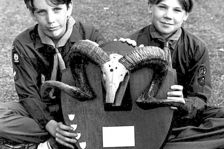 Scouts Christopher Bradley and Luke Underwood with the Teignbridge District Scouts Dyer Backwood Trophy which they won in June 1994