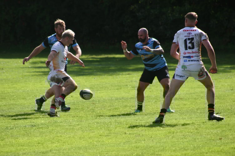 Newton Abbot RFC scrum-half Owen McLeod kicks through