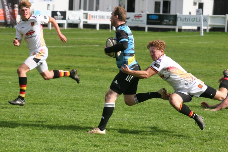 Joe Webber makes a diving tackle for Newton Abbot RFC