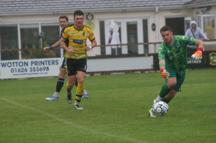Buckland forward Ryan Bush with eyes on the ball.