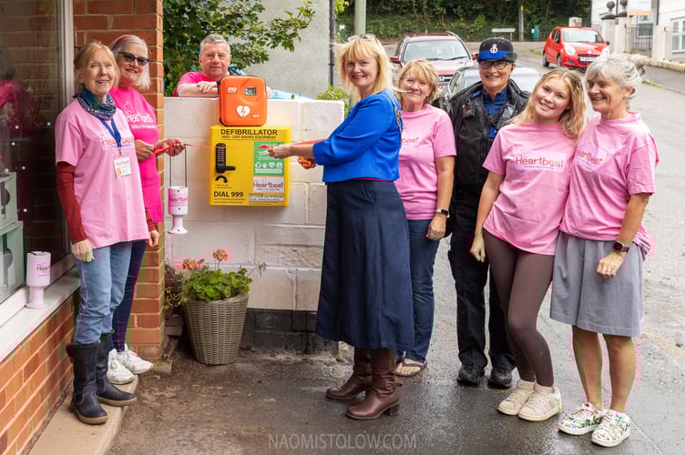 Teignmouth mayor councillor Cate Williams officially opens the new defibrillator on Coombe Vale Road.