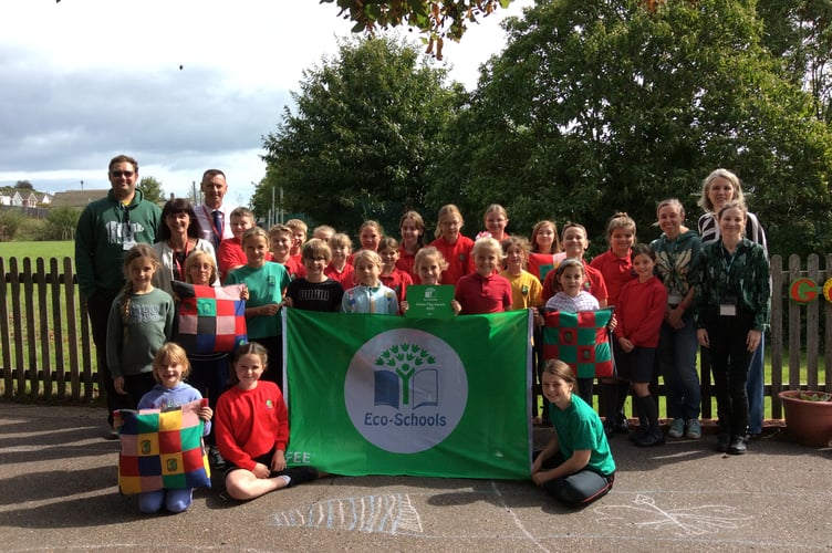 Hazeldown Primary School celebrates achieving a distinction level Eco Schools Green Flag