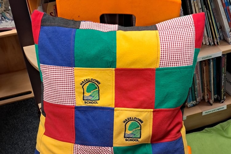 The Hazeldown eco committee upcycled old school uniform to make cushions for the library.