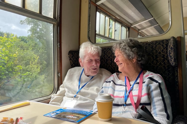 David and Maureen enjoying the chat, tea and countryside views on the Buckfastleigh Memory Cafe steam train