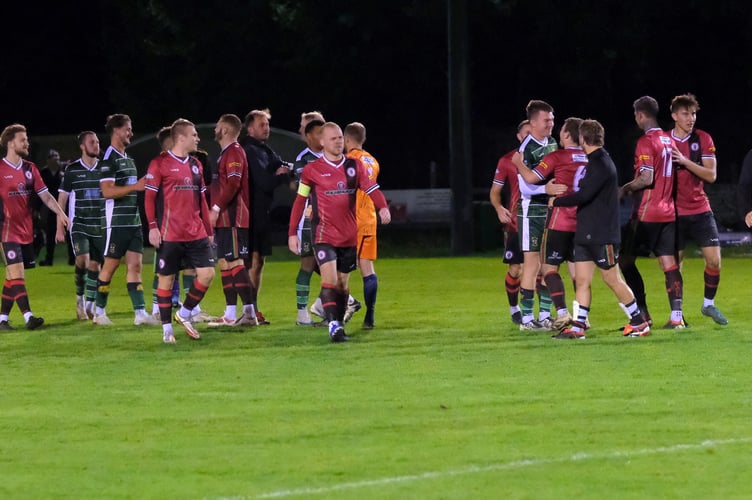 Post-game pleasantries at the WCR Ground