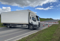 Business lifts blockade of A382 as signage dispute resolved