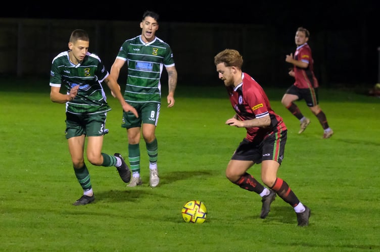 Cal Leech on the ball for Bovey against Buckland