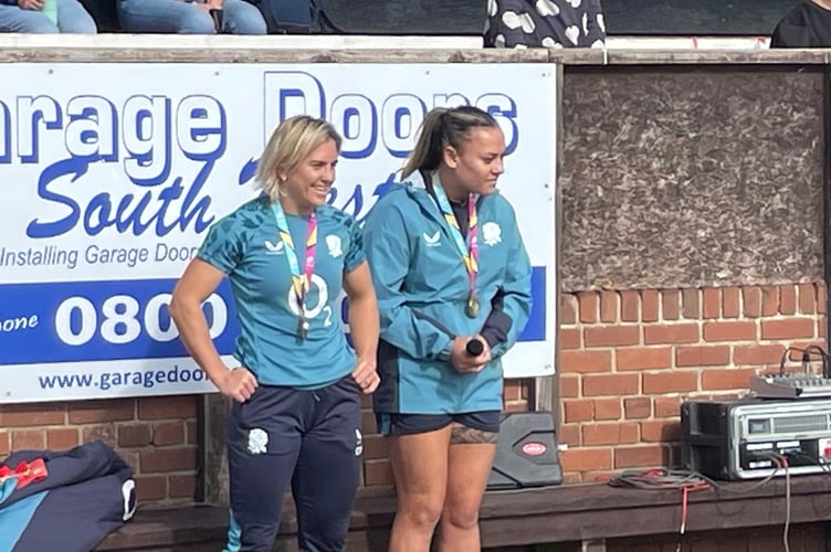 Claudia Moloney Macdonald and Maddie Feaunati answer questions at Teignmouth Rugby Club.