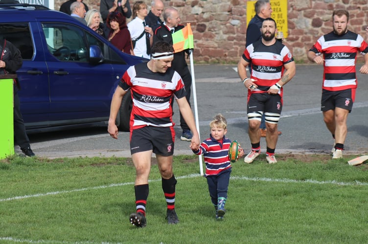 Former captain Pete Parsons was joined by son Charlie as he celebrated his 300th cap for Teignmouth (Photo: Lorna Gray)