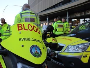 Blood Bike charity celebrating saving NHS £1million