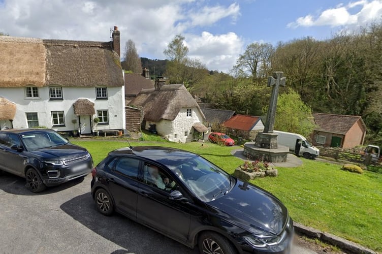 Lustleigh village green granite cross