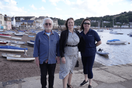 Commissioner Alison Hernandez in Teignmouth with Councillor Keith Underhill, left, and Jo Gask, owner of The Healthy Pet Shop, right