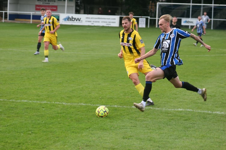 Chris Harvey is set to score Spurs' third against Crediton