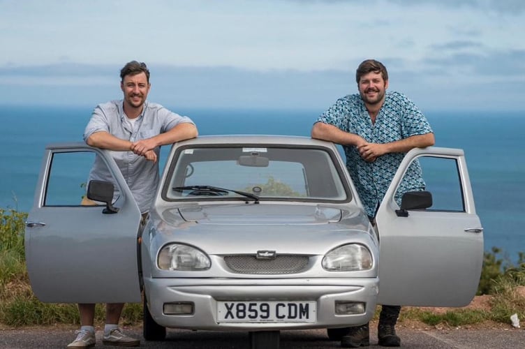Ollie Jenks, left, and Seth Scott with their Reliant Robin van.