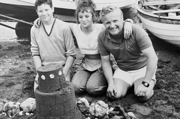 Shaldon Regatta Sandcastle competition from August 1987. Nicholas, Sarah and Dougie Brixton from Essex and their entry in the section for adults