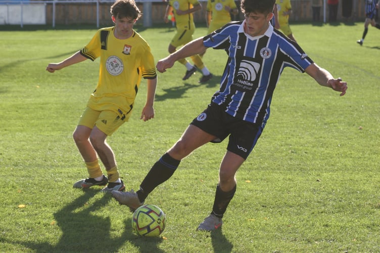 Tom Lobb on the ball for Newton Spurs