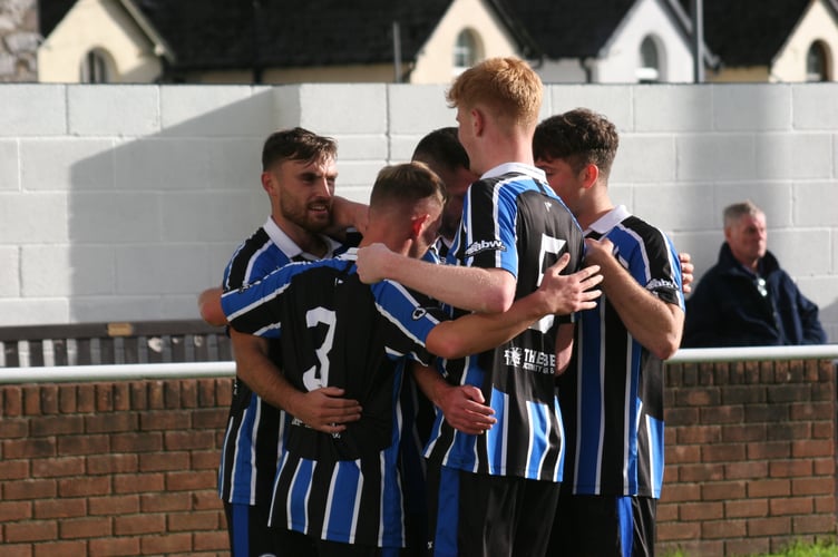 Newton Spurs celebrate their second goal against Bridport