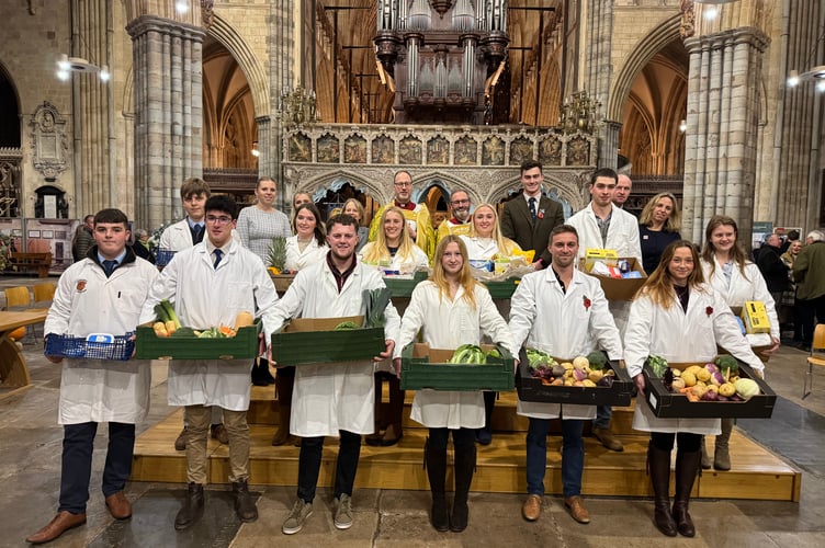 YFC representatives with offerings made during the service, with, back row, the speakers who took part, the Lord Mayor of Exeter, The Rev Canon James Mustard and The Rev Preb Matthew Tregenza.  AQ 6679

