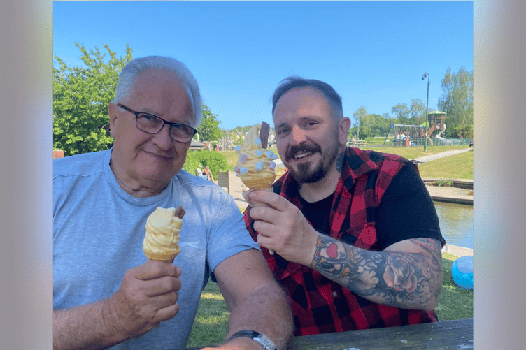 Mal Nash, right, with his father