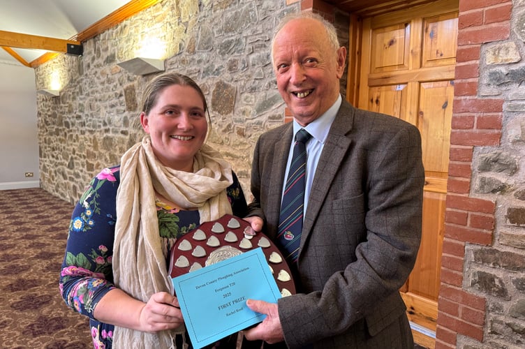 Rachel Reed won the Devon County Ploughing Association T20 trophy, presented by President Raymond Govier.  AQ 7128
