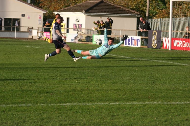 Andrew Sowden-Bird making a superb save for Buckland.